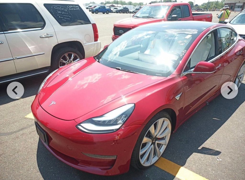 tesla model 3 2018 5YJ3E1EB8JF055622 image tesla model 3 2018 5YJ3E1EB8JF055622 image